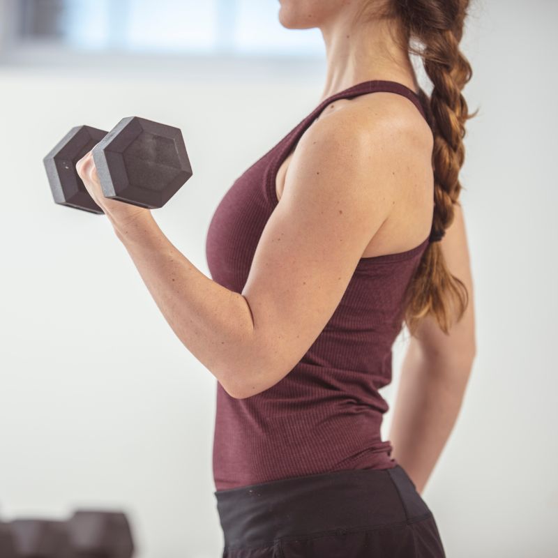 Girl Lifting Weights Image of Girl Lifting Weights